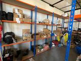 many boxes and bags on the shelves in the warehouse