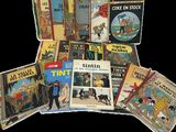 many children ' s books that are sitting on a table