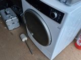 an image of a washing machine and a dryer on the floor