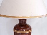 a lamp that is sitting on a table with a lamp on it