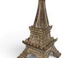 the eiffel tower is made out of metal and has intricate carvings