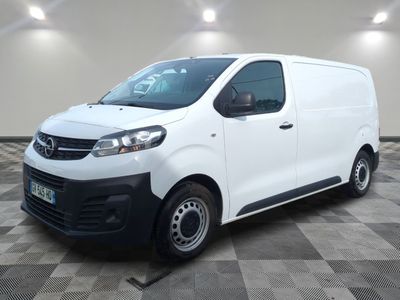 a picture of a white van parked in a room