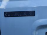 a close up of the back end of a white truck