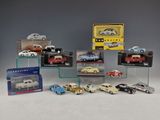 a lot of toy cars on display in a display case