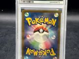 a close up of a pokemon trading card in a plastic holder