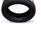 a close up of a tire on a white background