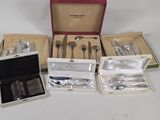 a box with silverware in it on a table