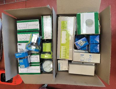 a box full of assorted items sitting on a table