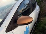 a white car with a blue star on the side of it