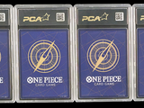 three packs of one piece of video game cards are in plastic cases
