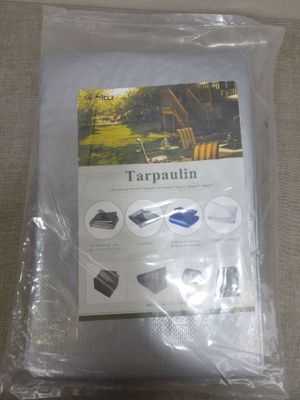 a bag of tarpaulin sitting on a table