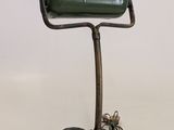an image of a desk lamp with a green shade on it