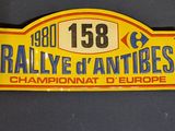 an image of a yellow and blue sign that says rallye d ' antibes champion of europe