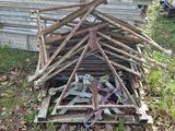a pile of sticks that are sitting on the ground