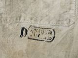 a close up of the back of a jacket with a label on it