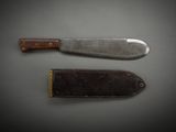two knives that are sitting next to each other on a table