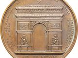 an image of a bronze medal depicting the arch of triumph