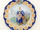 a plate with a picture of a woman holding a basket