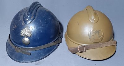 two helmets sitting next to each other on a table