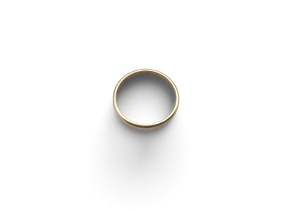 a close up of a gold ring on a white surface