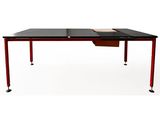 a black and red table with a book on it