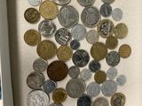 a picture of a shadow box with coins in it