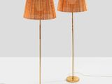 a pair of lamps on a table with a white background