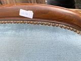 a chair that has a label on the back of it