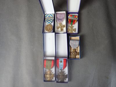 a box with medals and medals in it on a table