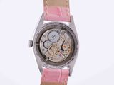 an image of a watch with a pink strap on a white background