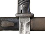 a close up of a knife on a metal pole