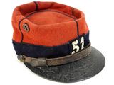 an orange and blue hat with the number 47 on it
