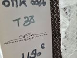 a sign that is attached to a piece of lace