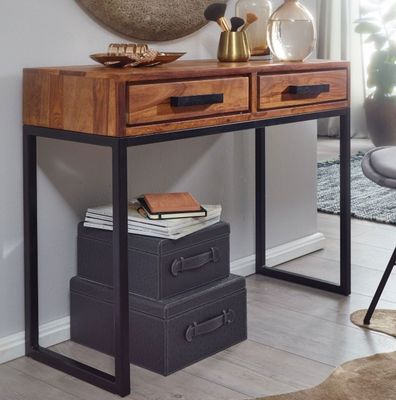 une table en bois avec deux tiroirs et un miroir accroché au mur