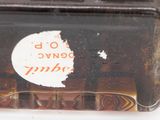 a piece of luggage with a sticker on it
