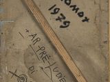 a piece of paper with writing on it and a wooden stick