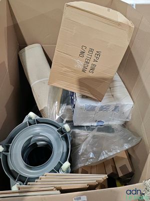 a cardboard box full of items that are in it