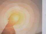 a picture of a cat that is sitting in front of a sun