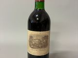 a bottle of wine that is sitting on a table