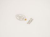 an image of a white plate with a bird on it ' s side