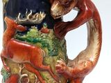 an image of a beer mug with a dragon on it