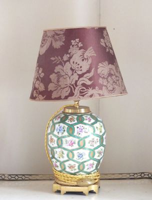 a lamp that is sitting on a table in a room