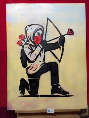 tableau représentant un homme avec un arc et une flèche sur fond rouge