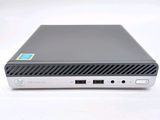 the back of a laptop computer sitting on top of a white surface