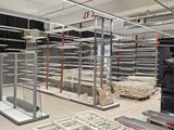 a large room with a lot of shelves and a lot of boxes