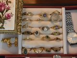 a box with a bunch of rings in it