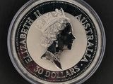 une image représentant une pièce d'argent à l'effigie de la reine Élisabeth