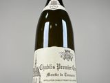 a bottle of wine that is sitting on a table
