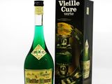 a bottle of wine that is next to a box
