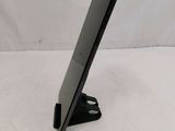 a black tablet computer on a stand on a white surface